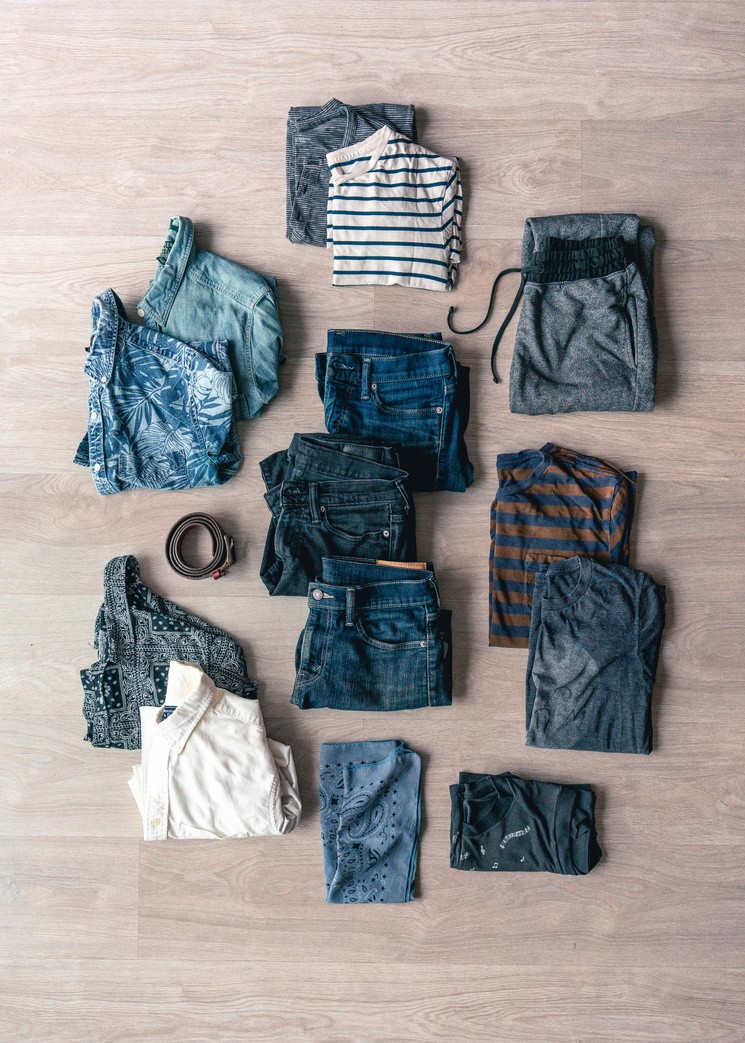 Clothing flat lay with jeans, tops and shoes